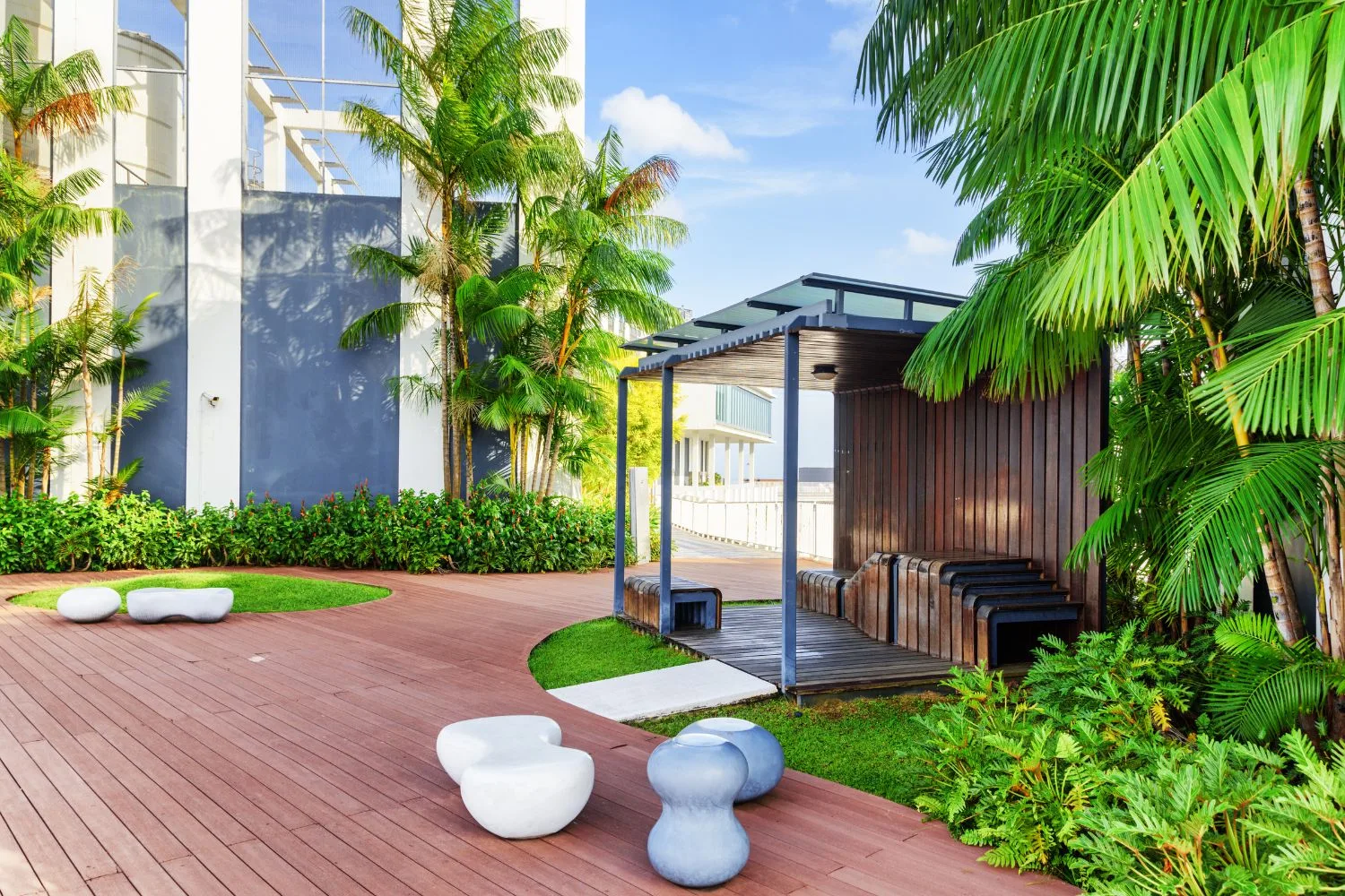 Landscaped garden and pathway beside a modern building