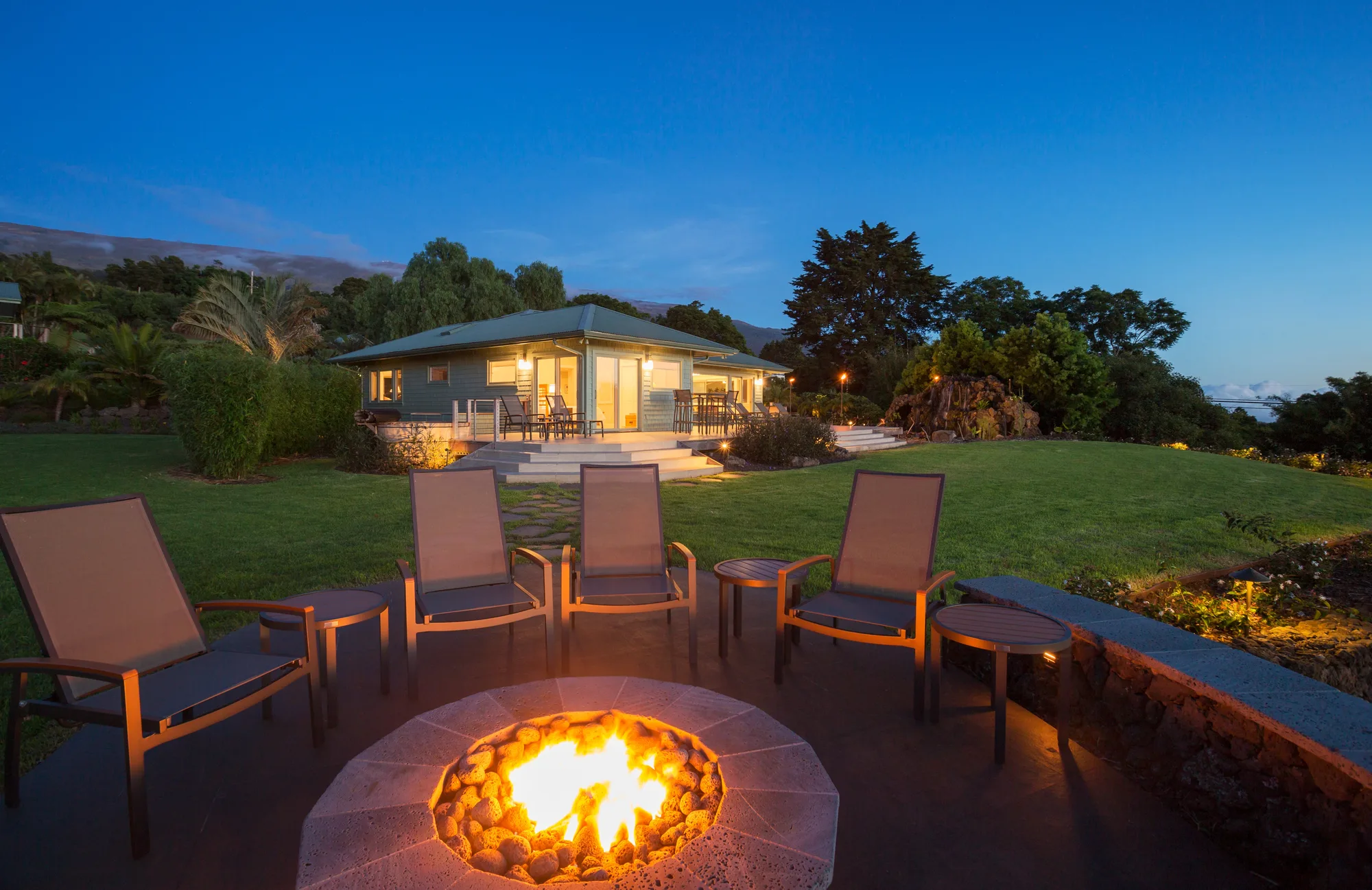 Outdoor fire pit area with seating for entertaining