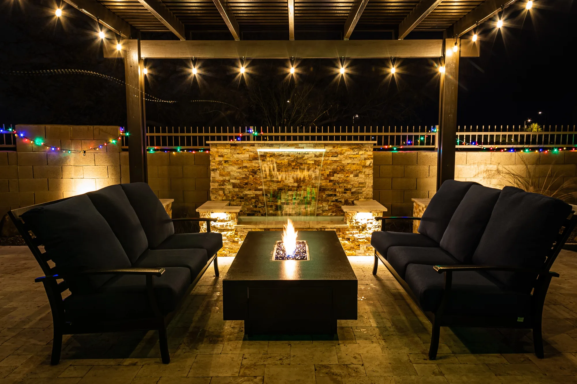 Outdoor fire pit area with seating for entertaining