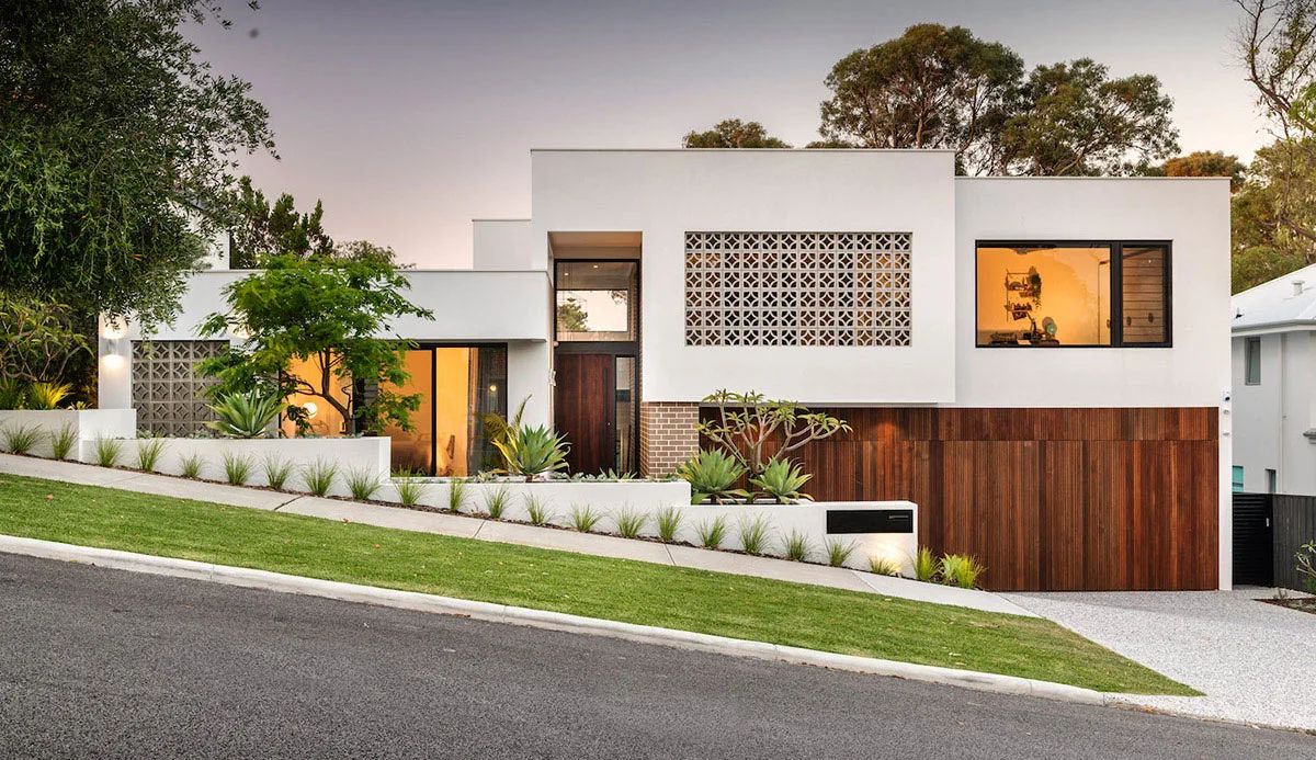 Freshly landscaped Western Sydney backyard with lawn and garden beds